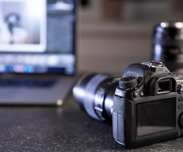 Home professional,camera,on,a,blurred,background,with,a,laptop.,the